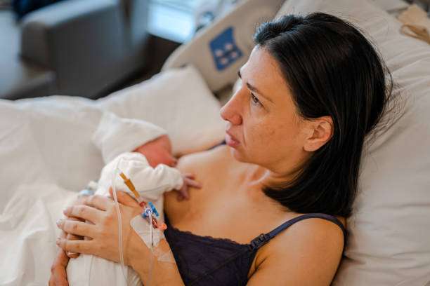 A new mother bonds skin-to-skin with her newborn; a breast pump can support feeding.